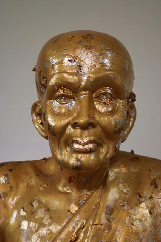 golden monk statue 0