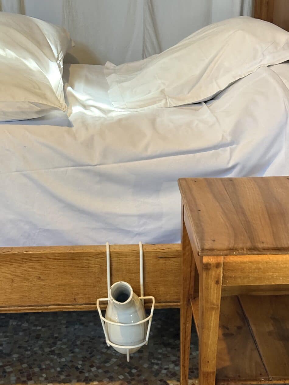 A bed in the hall of the poor.