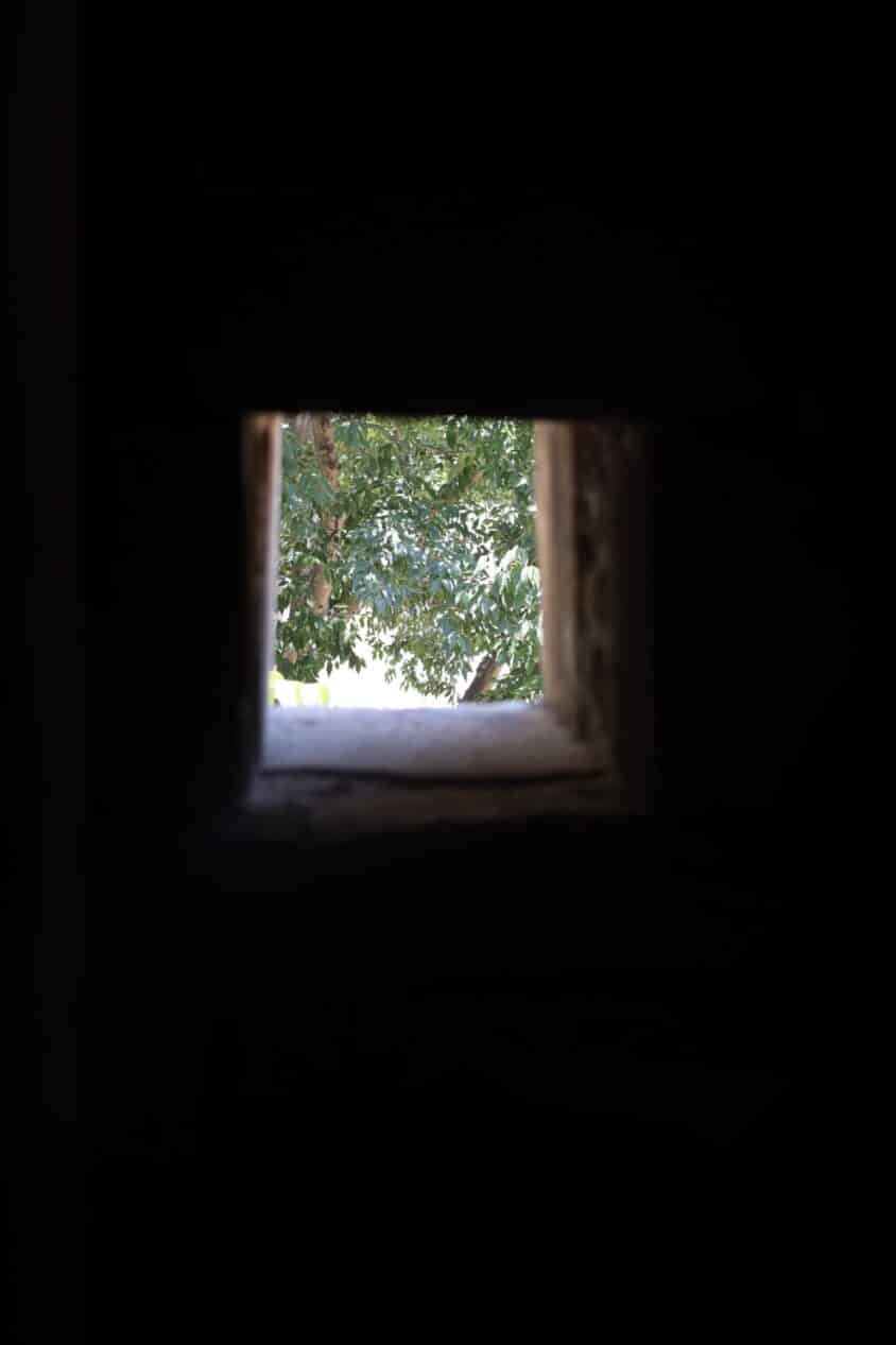 Through a small window.