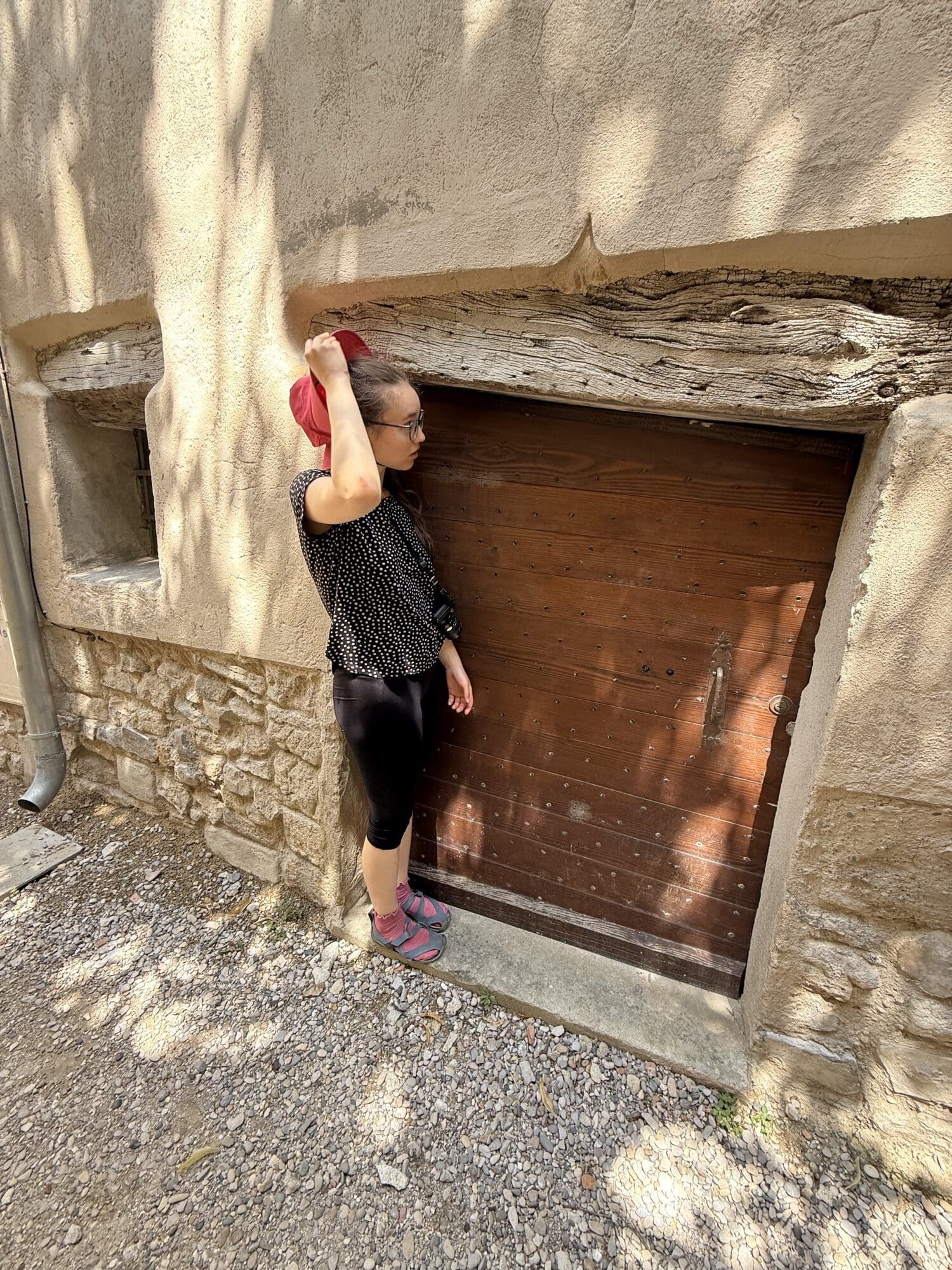 An old door in the Haute Ville — the lintel a single beam of ancient wood.